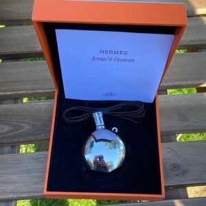 Hermes chrome bottle necklace bag charm leather cord refillable dabber screw top